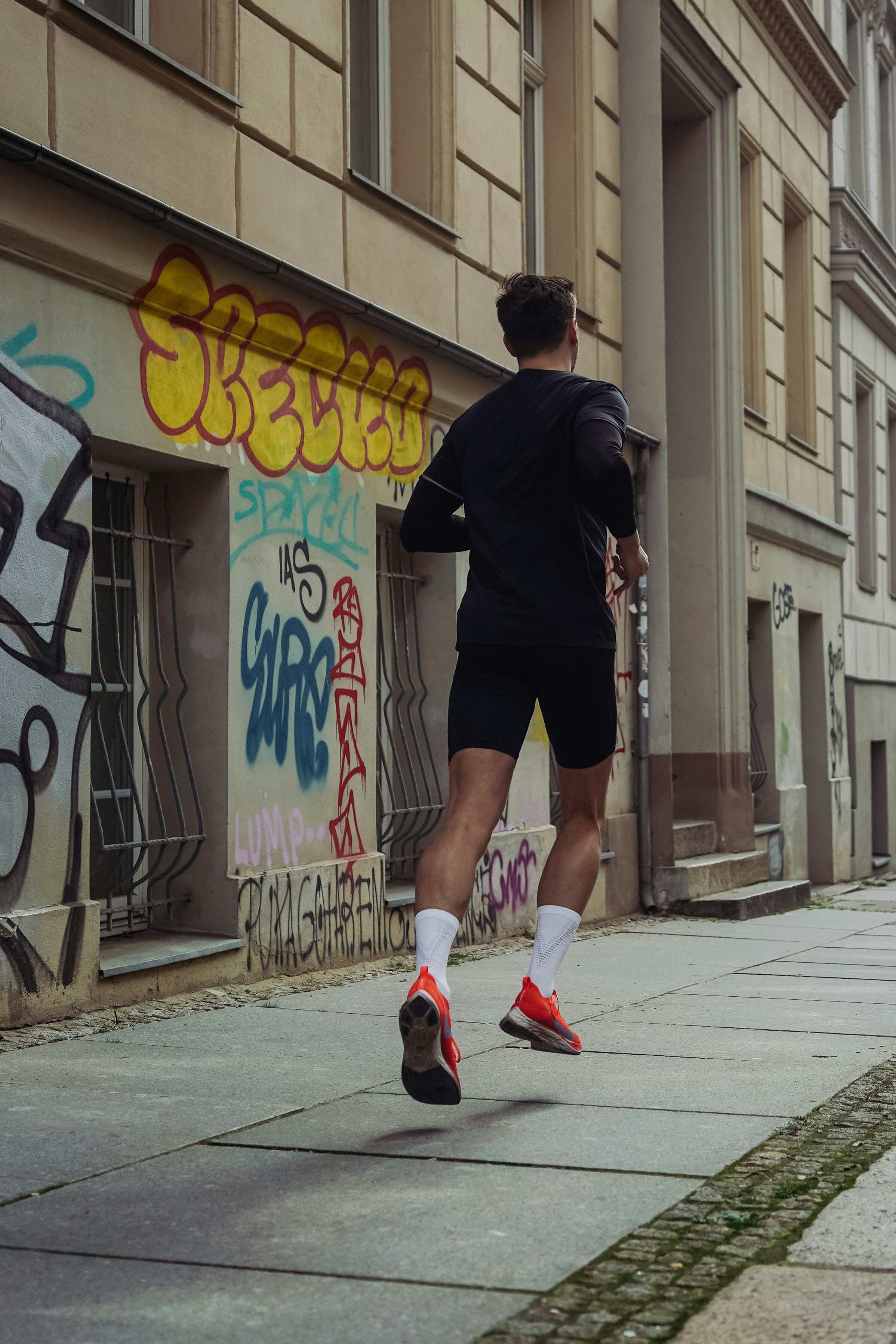Urban runner with bright shoes
